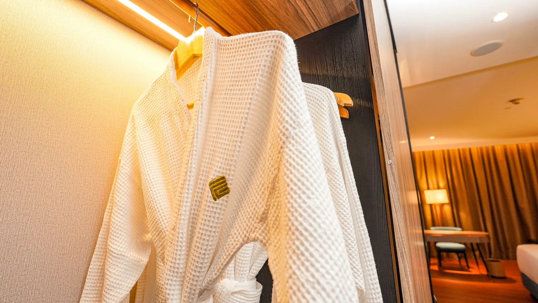 White waffle bathrobe in a hotel wardrobe
